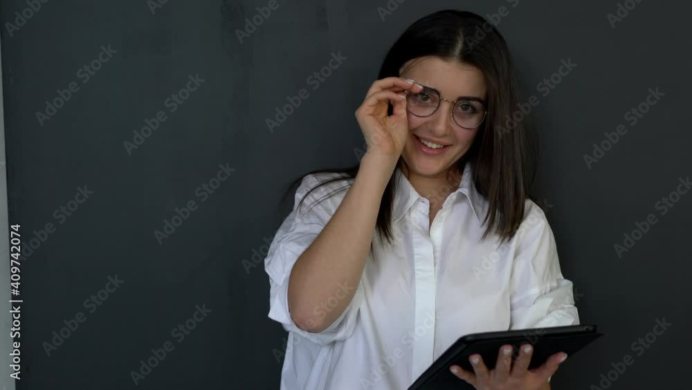 Aufkleber happy caucaisan millennial in optical eyewear for provide eyes correction smiling while using applic