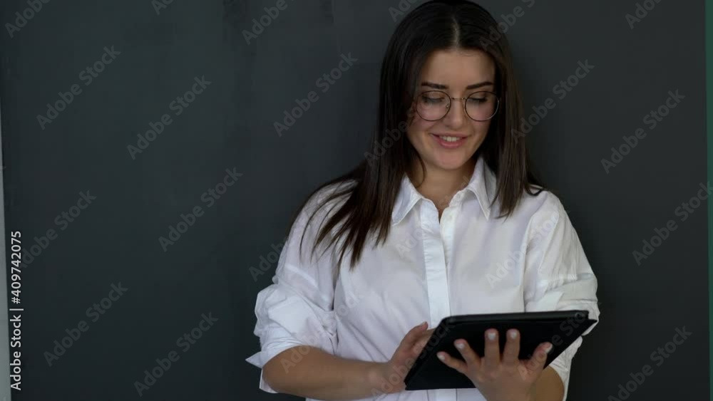 Poster happy caucaisan millennial in optical eyewear for provide eyes correction smiling while using applic