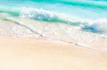 Emerald waves on the shore
