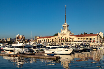 The building of the sea station in Sochi on a sunny day with a view of the yachts.