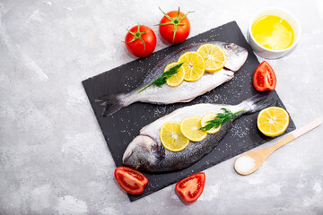 Two fresh dorado ready to cook. The concept of correct or healthy food.