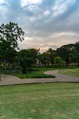 Fototapeta premium Vertical photo of beautiful public park at dusk 