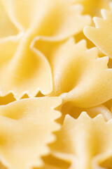 italian farfalle pasta raw uncooked blur defocused