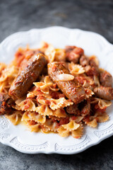 italian sausage farfalle pasta in tomato sauce