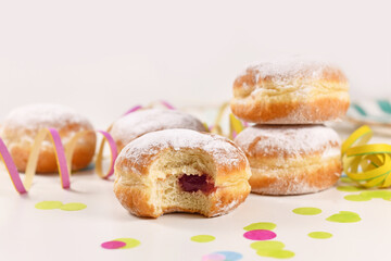 Berliner Pfannkuchen, a traditional German donut like dessert made from sweet yeast dough fried in...