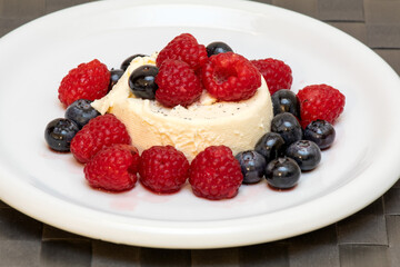 Panna Cotta with raspberry and blueberry