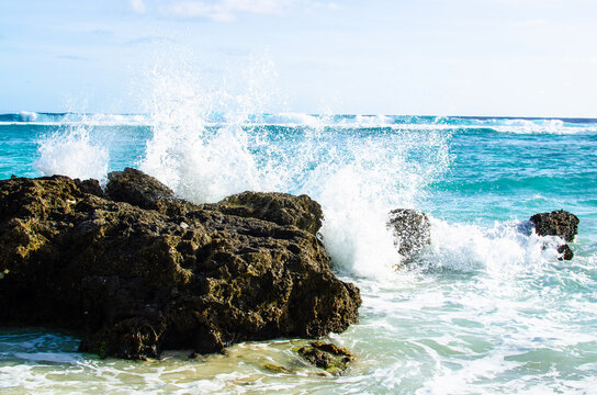 Washes crashing into rock on Tarague Beach, Guam