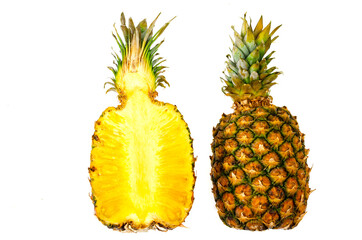 Two halves of sweet ripe pineapple isolated on white background. Studio Photo