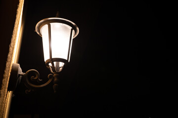 Fototapeta na wymiar old lamp shining in the night