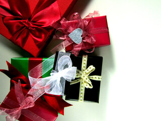 Various gift boxes prepared for Valentine's Day on a white background.