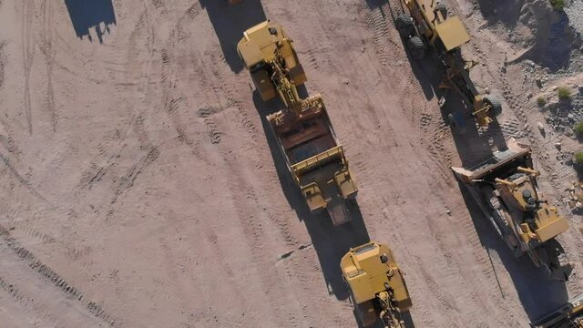 construction equipment in desert landscape big heavy machinery tractor trailers