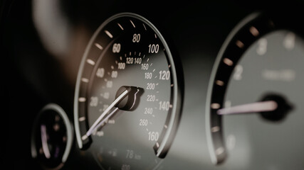 Modern car miles Speedometer close up.