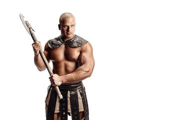 Studio shot of muscular ancient warrior man posing with axe. Isolated on white. Copy space