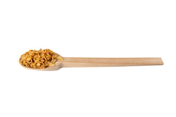 Crispy carmelized fried onion flakes in wooden spoon isolated on white background. Spices and food ingredients.