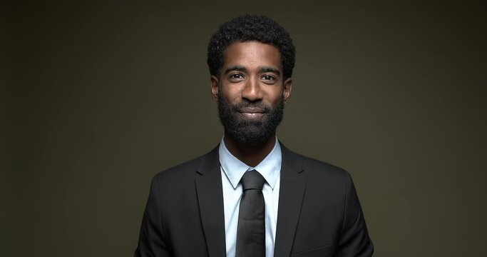 Beautiful happy handsome man with facial expressions in front of a colored background
