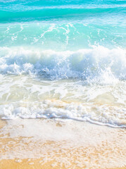 closeup of waves on the beach