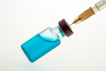 VIAL OF COVID VACCINE AND SYRINGE FOR INJECTION. CORONAVIRUS VACCINATION CONCEPT. CENTAURUS SUB VARIANT.