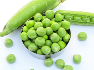 fresh peas isolated on white background