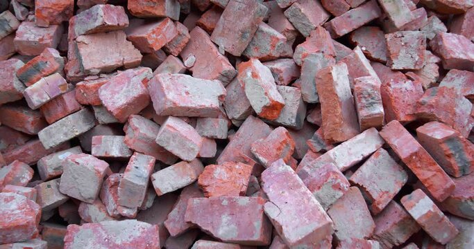 Pile of old, used clay bricks