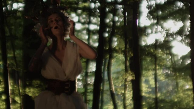 Woman Dressed As Azazel Dancing In Forest
