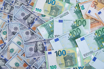 Close-Up of US dollars and Euros. Money background.