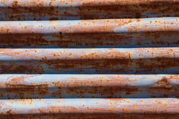 rusty corrugated iron in the sun