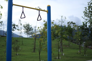 Fototapeta na wymiar empty swing on a playground