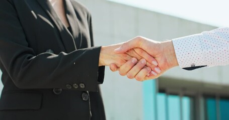 handshake two business people outside