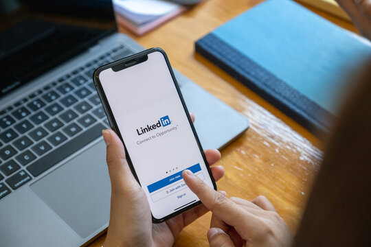 CHIANG MAI, THAILAND: FEB 01, 2021: LinkedIn logo on phone screen. LinkedIn is a social network for search and establishment of business contacts. It is founded in 2002.
