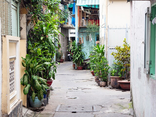 Fototapeta na wymiar Narrow backstreet in Ho Chi Minh City, Vietnam