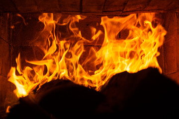 Burning cozy fire. Glowing fireplace logs, pattern abstract.