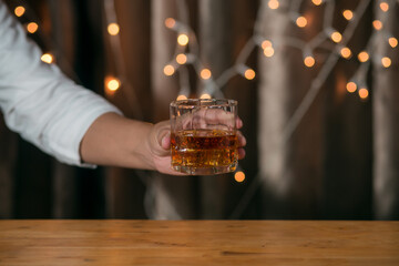 bartender pouring beer in bar