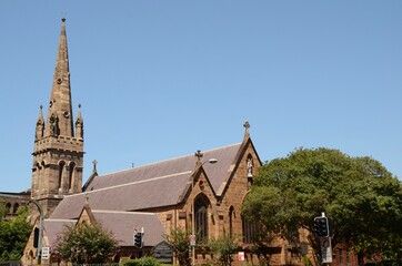 St Benedicts Catholic Church in Chippendale, Sydney, Australia - exterior against a bright blue sky