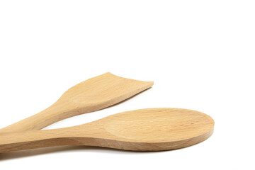 Cooking wooden spoon and spatula on white insulated background.Selective focus.