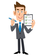 チェックリストを持つビジネスマン
