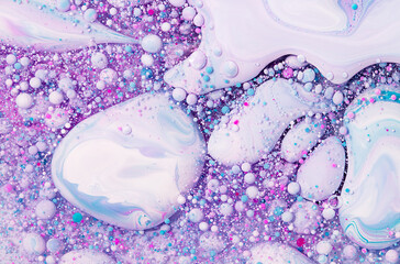Fluid art texture. Abstract background with swirling paint effect. Liquid acrylic artwork with flowing bubbles. Mixed paints for website background. Purple, turquoise and white overflowing colors