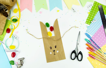 DIY and kids creativity. Step by step instructions: how to make an Easter bunny packaging from a...
