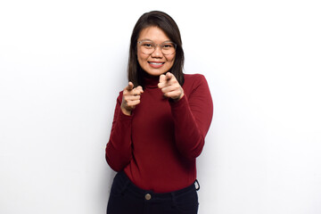 Pointing at you gesture of Young beautiful asian women dress red shirt isolated on white background