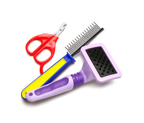 Pet care accessories on white background