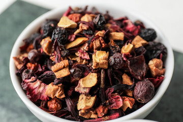Bowl with dry fruit tea, closeup