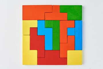 Obraz premium Different wooden blocks on white background. Concept of logical thinking and education