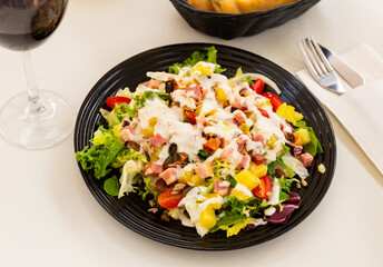 spanish salad with latucce, cabbage and bacon for lunch