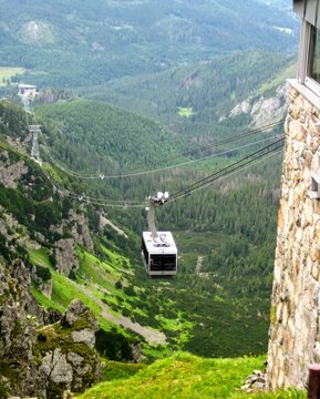 View from the top railway station at Kasprowy Wierch mountain to the cable car belonging to Polish Cableways   (Polish: PKL - Polskie Koleje Linowe). Polish Tatra Mountains, near Zakopane ski resort. 