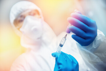 Concept impact of vaccination of people on marketplace, stock exchange, economic growth. Nurse holds syringe with vaccine