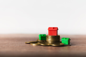 Saving plan to buy property, house. Plan of successful property investment with blank background.