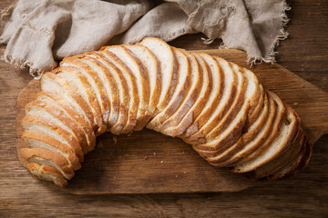 sliced bread on wooden cutting board