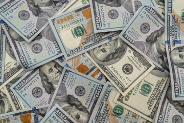 pile of american money 100 dollar bills as background