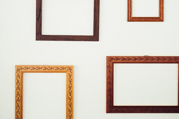 empty picture frame on white wall