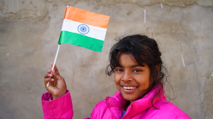 Tricolor National flag closeup. Cheerful girl remembering the National patriot on the 72 th...