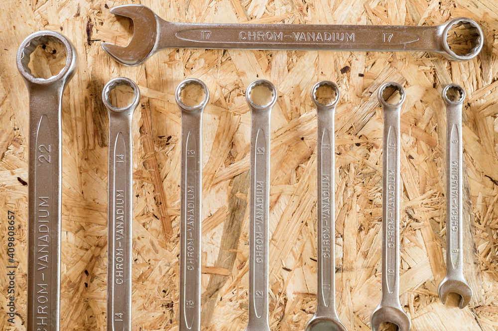 Wall mural set of various repair hand tools or auto mechanic's tools. repair tool kit. equipment for building. wooden background, pattern, top view